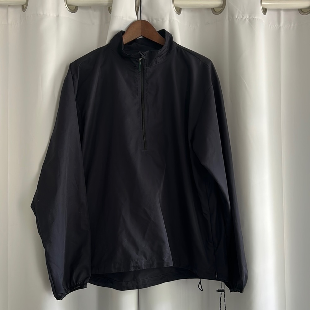 As new - Golf wind / light rain jacket. Cute details, designed for women!